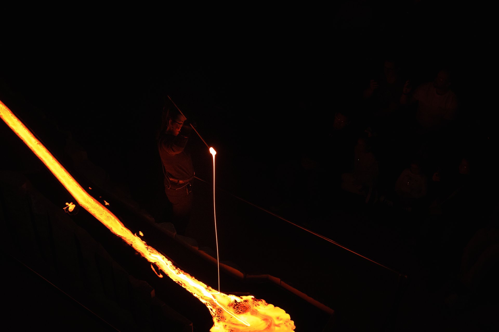 Lava Show glowing red orange flowing molten rock heat