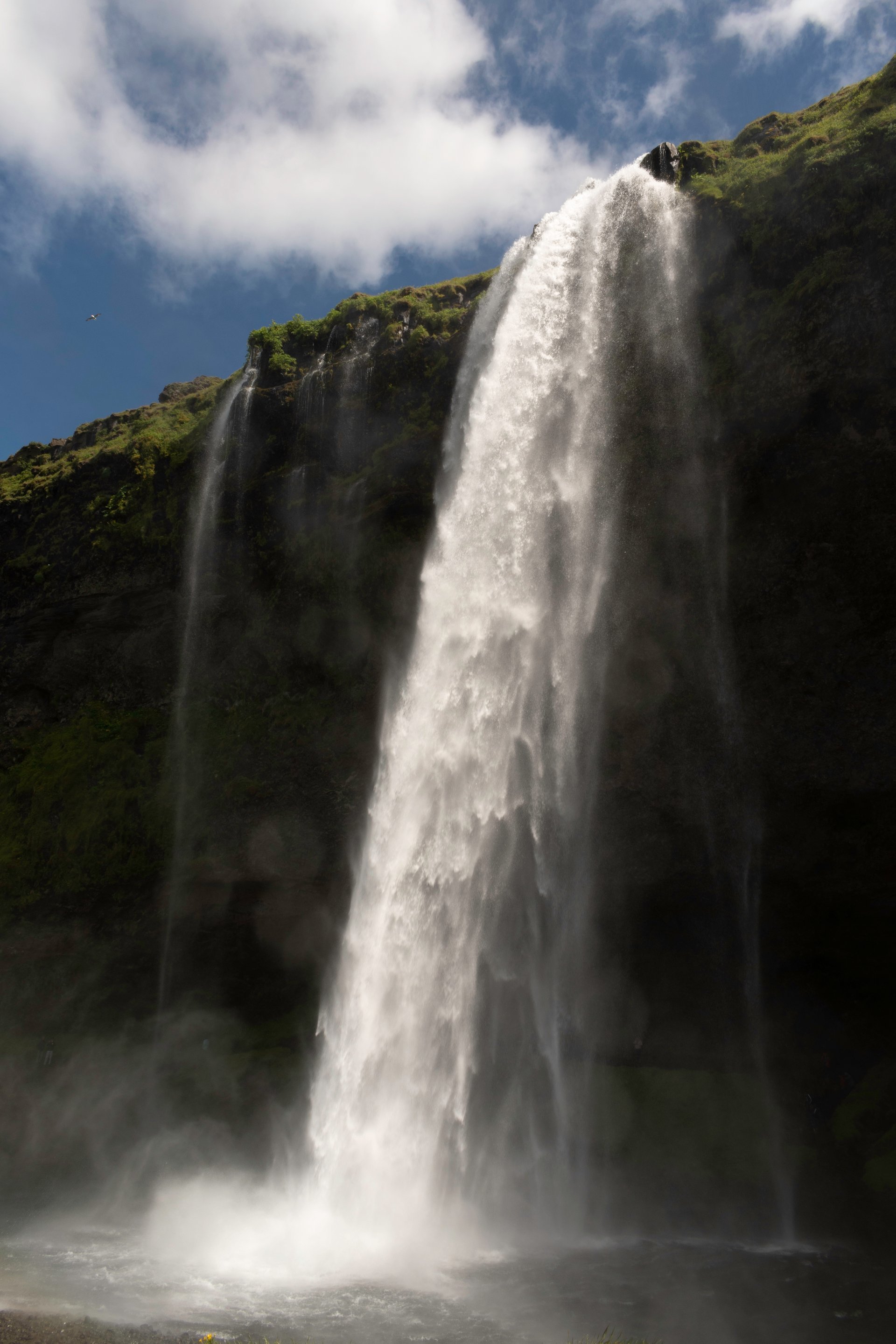 Seljalandsfoss waterfall with its famous walk-behind path