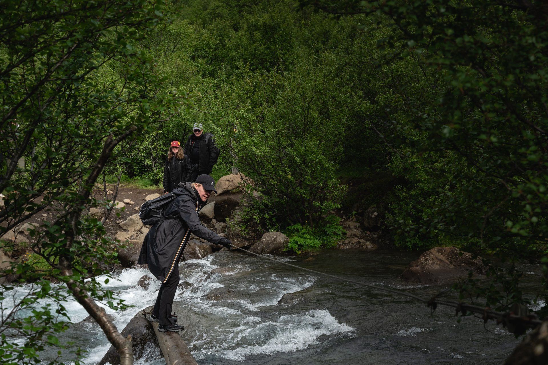 The Glymur waterfall canyon with cascading water dropping nearly 200 meters