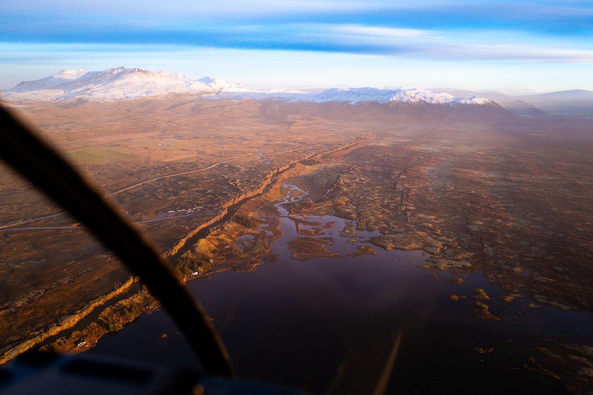 Helicopter tour over Þingvellir National Park tectonic rift and Skjaldbreiður volcano