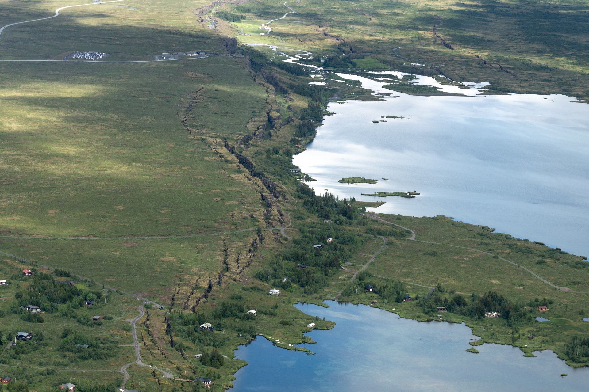 Volcanic terrain with colorful mineral deposits aerial shot