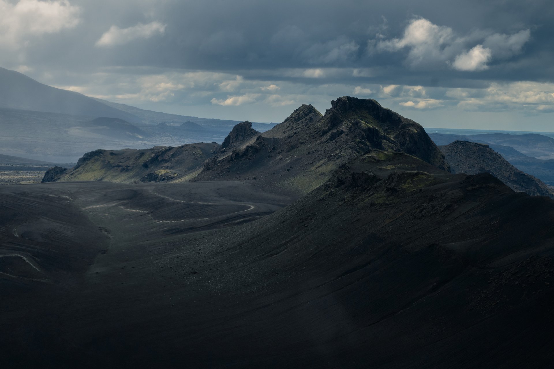 Remote highland valleys photographed from private helicopter