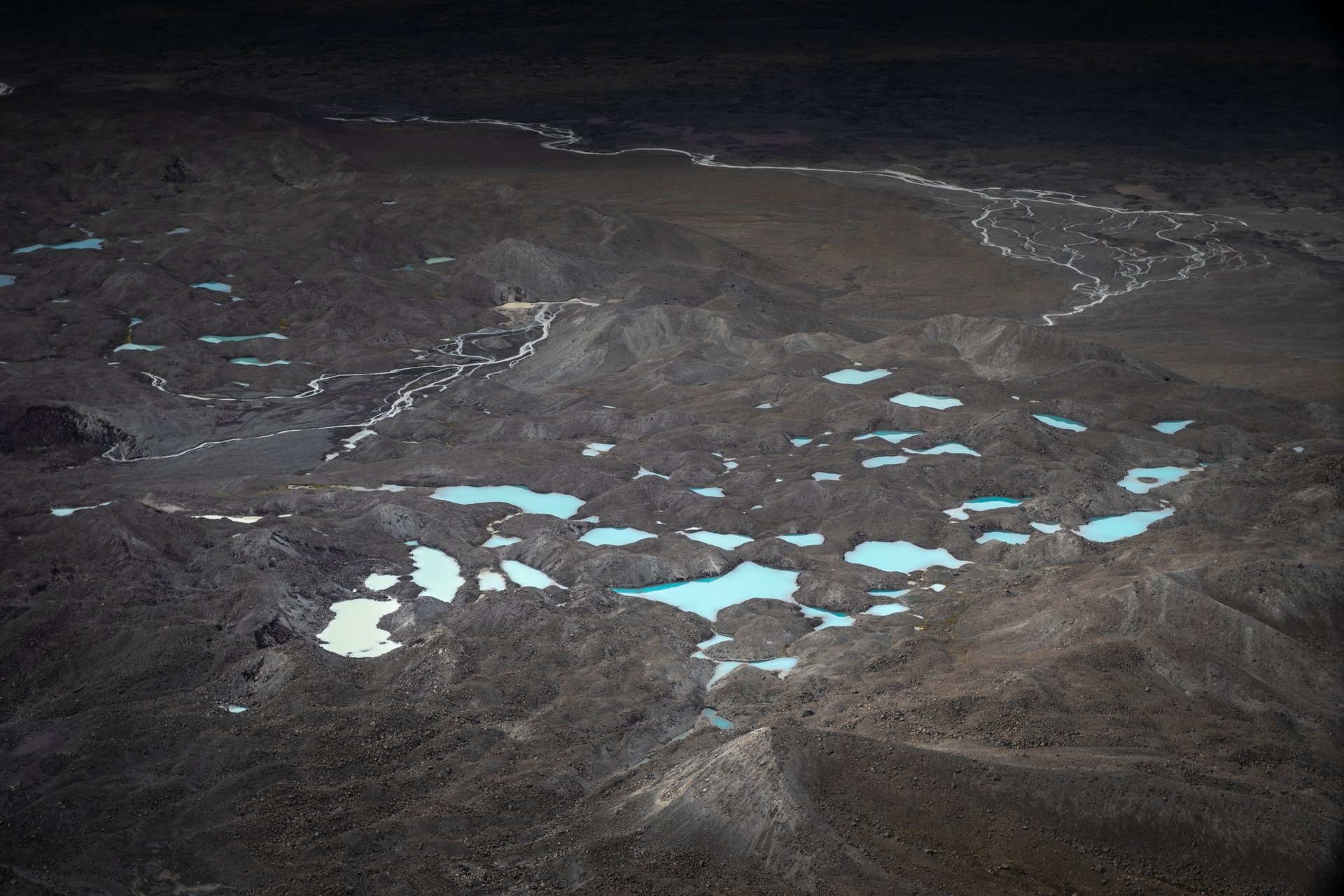 Sunset light over Iceland landscape from helicopter