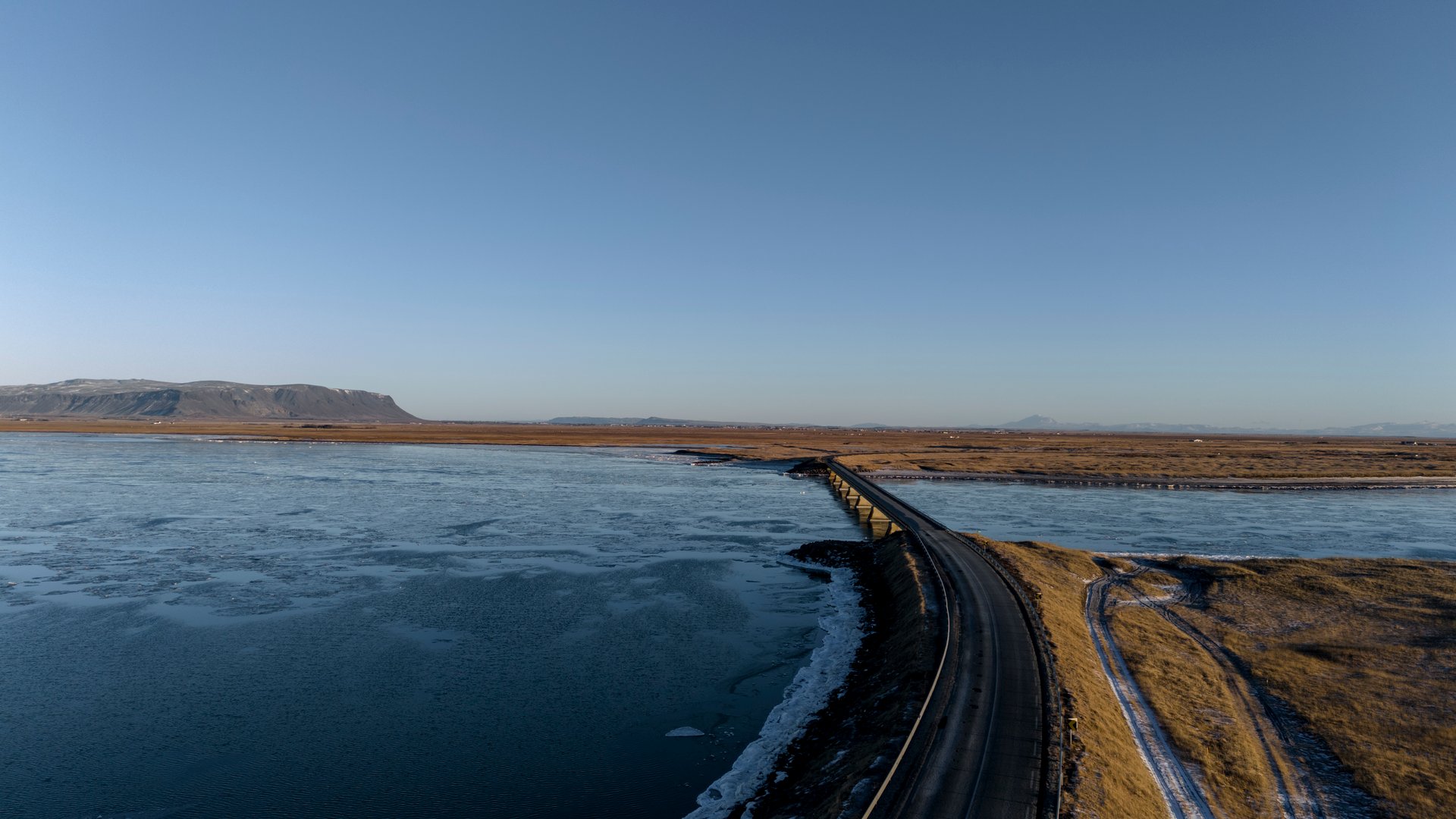 Icelandic road in contrasting weather conditions