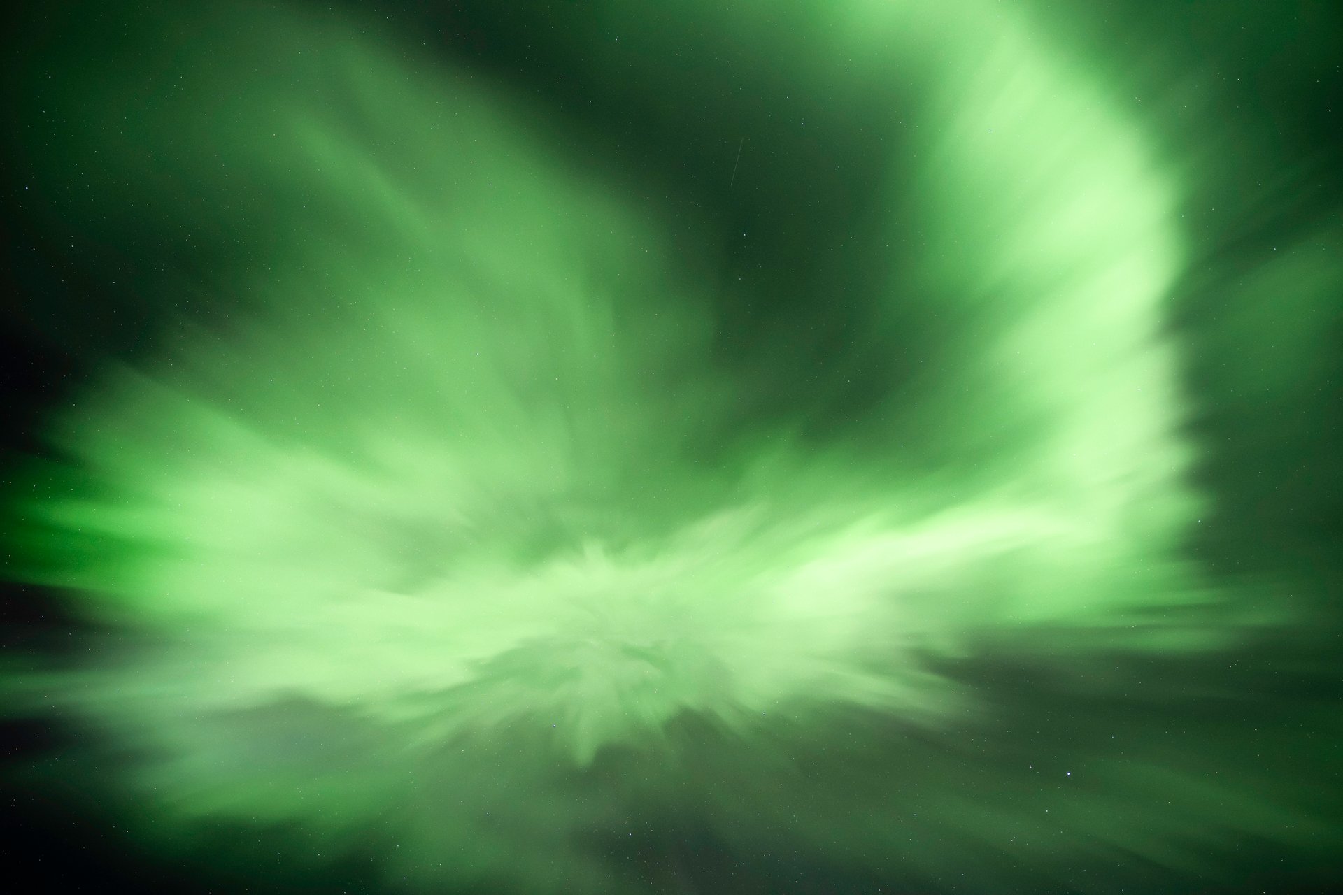 Dynamic aurora display with multiple colors dancing overhead