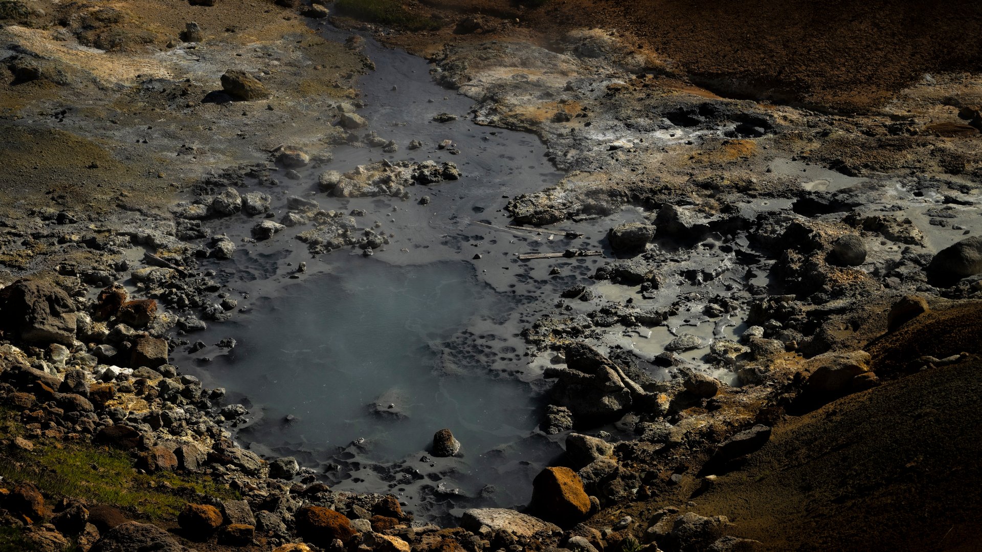 Seltún sulphur-stained yellow and rust-red ground geothermal field Reykjanes Iceland