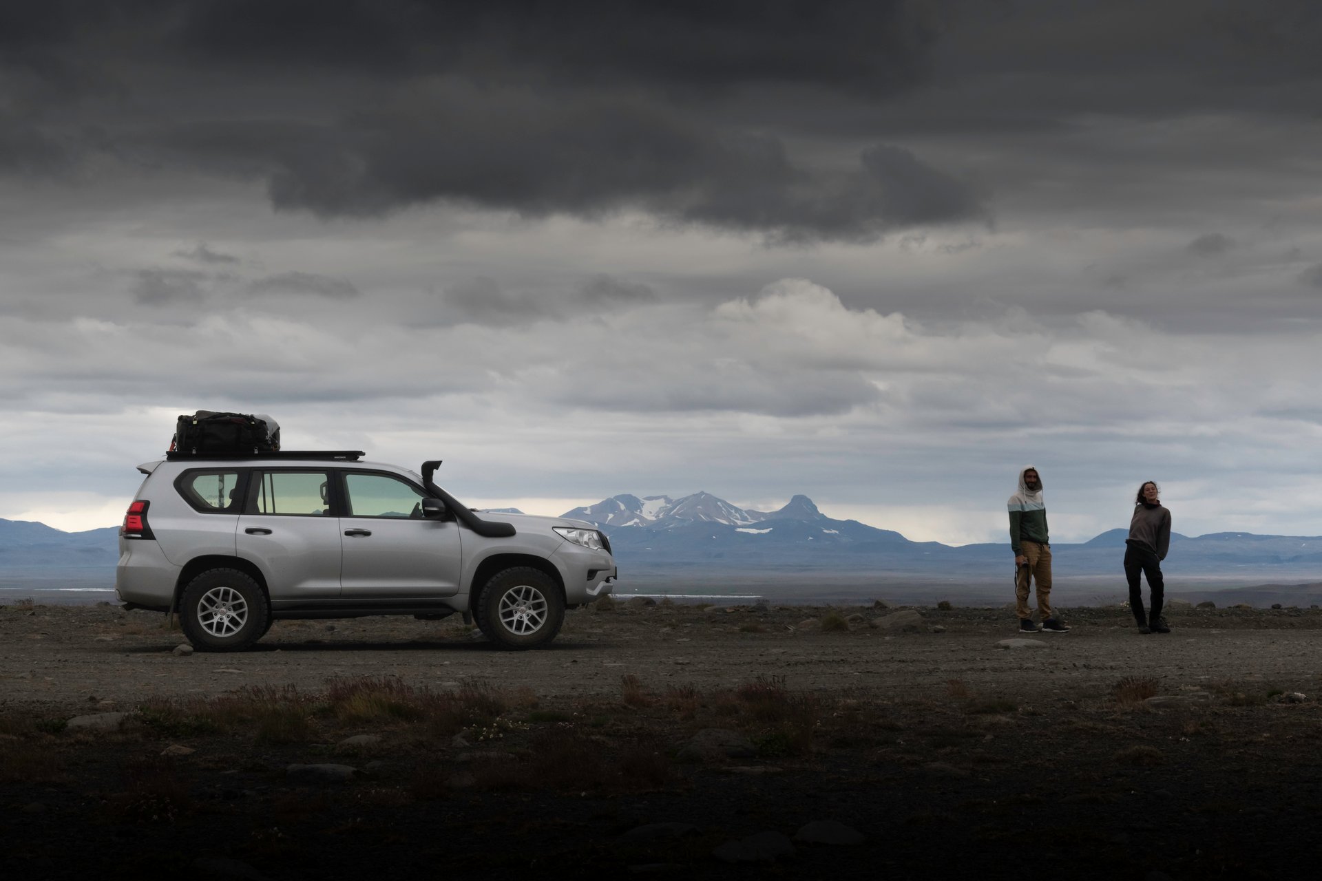 Highland expedition in Iceland with rhyolite mountains and glacial plains