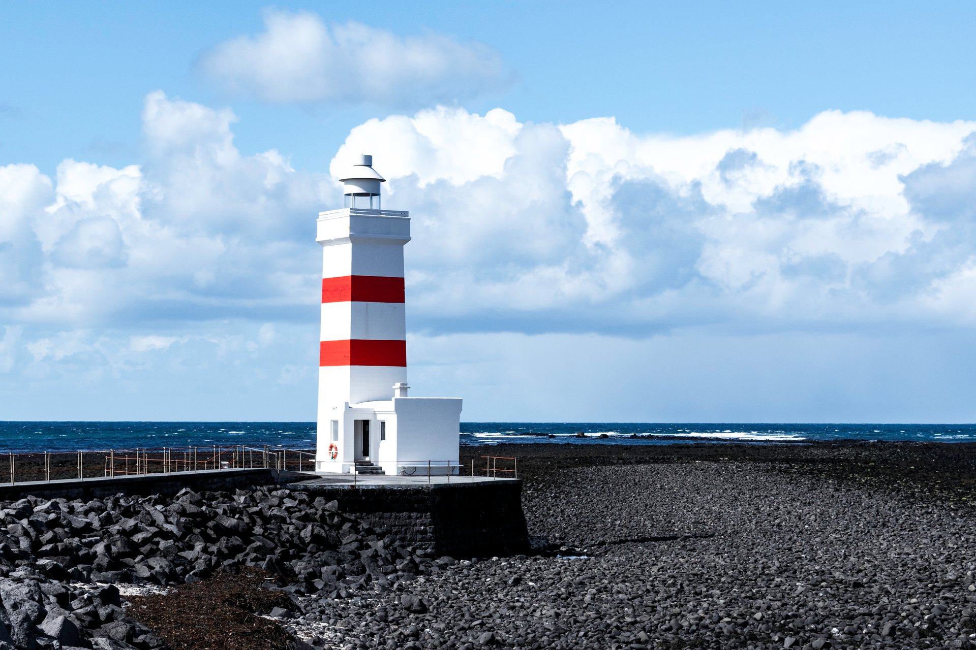 Garður coastal area with dual lighthouses sunset