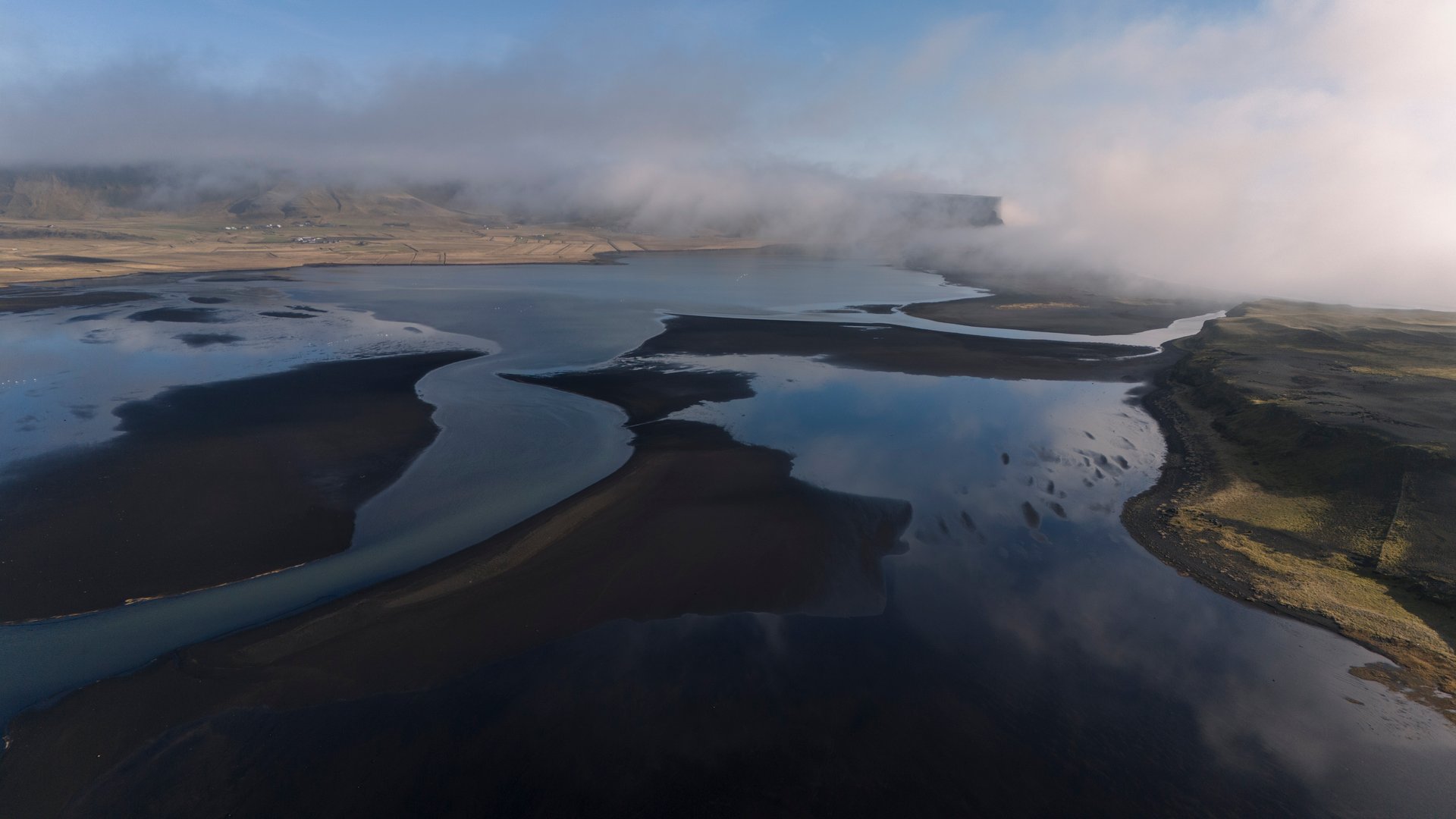 Dýrhólaey lighthouse view Iceland coastline