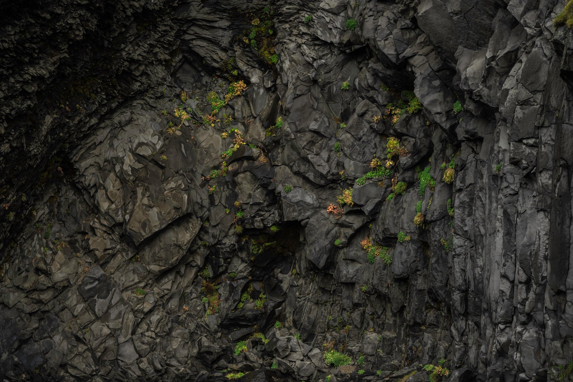 Close view of Reynisfjara showing the dramatic black sand and ocean waves