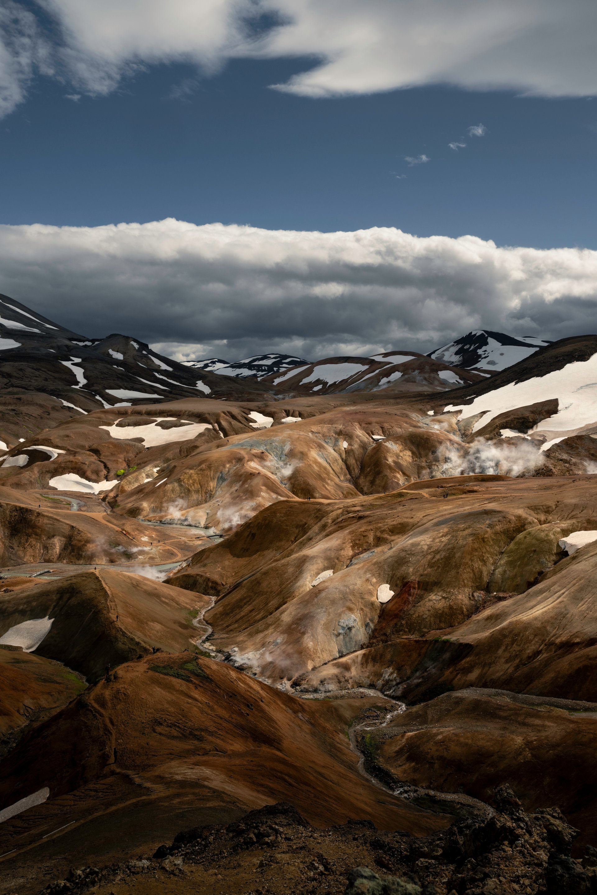 Hveradalir geothermal valley with steaming vents and colorful rocks