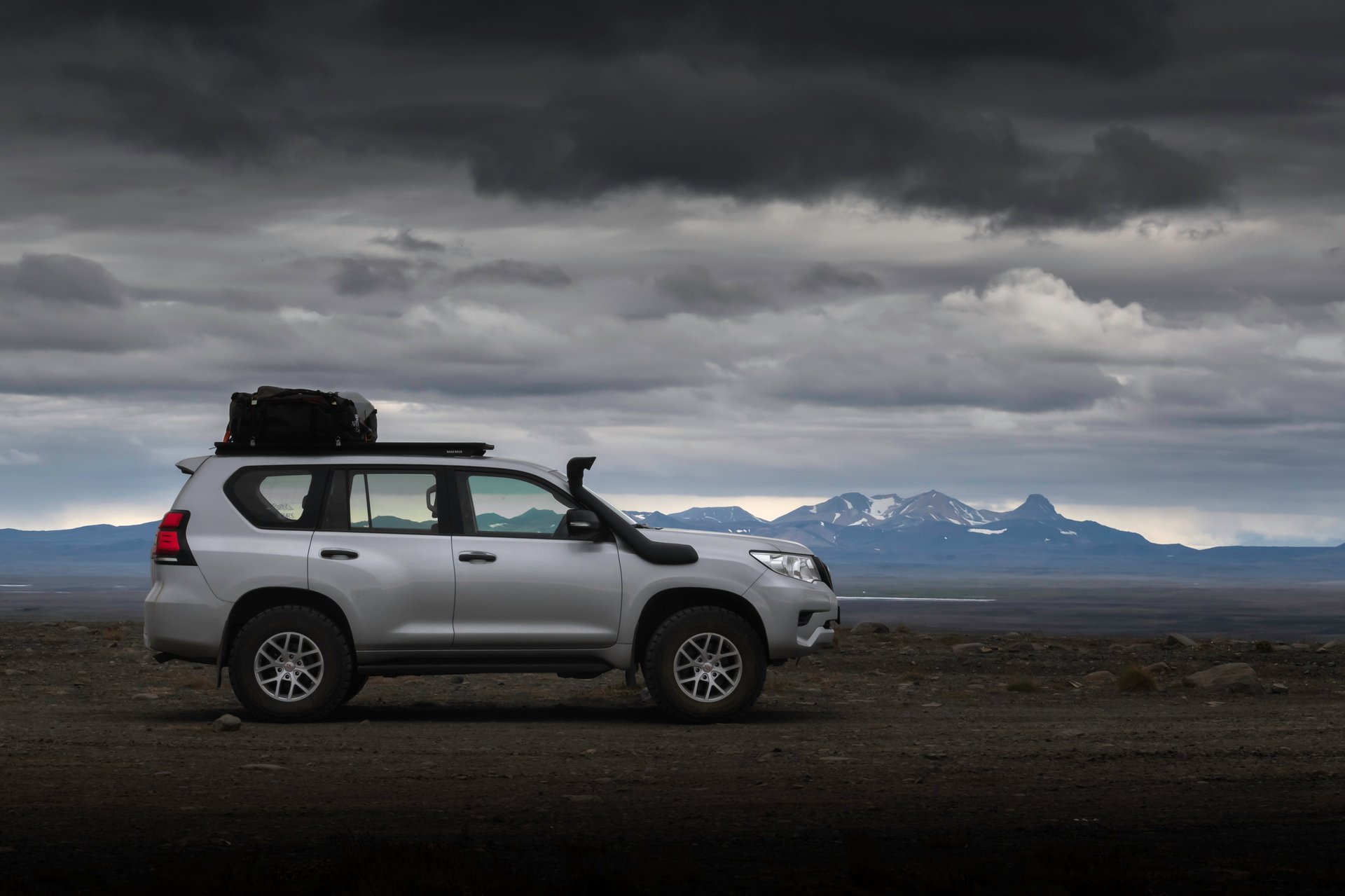 Land Cruiser with camping equipment ready for highland expedition