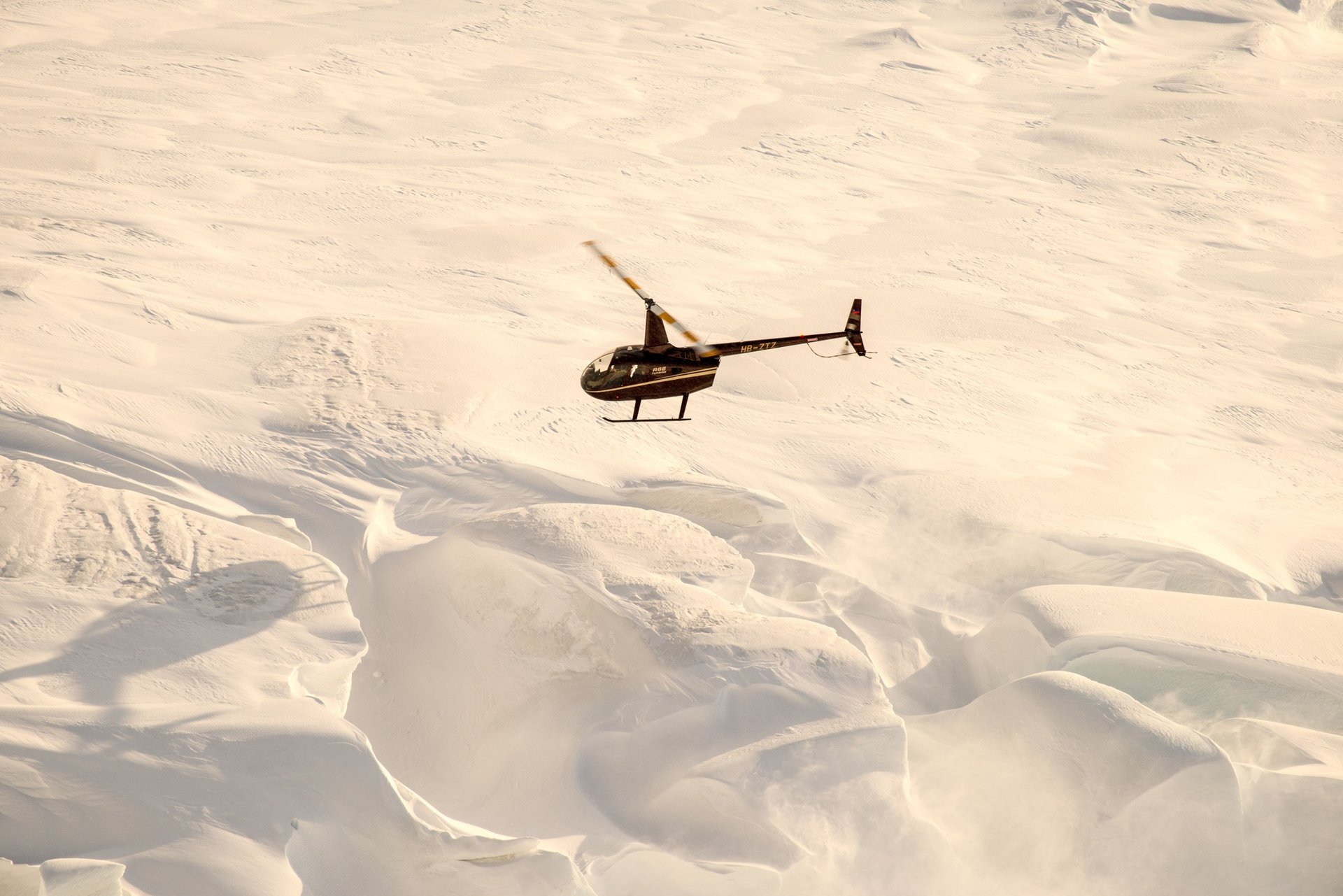 Travelers exploring ancient ice formations on glacier surface
