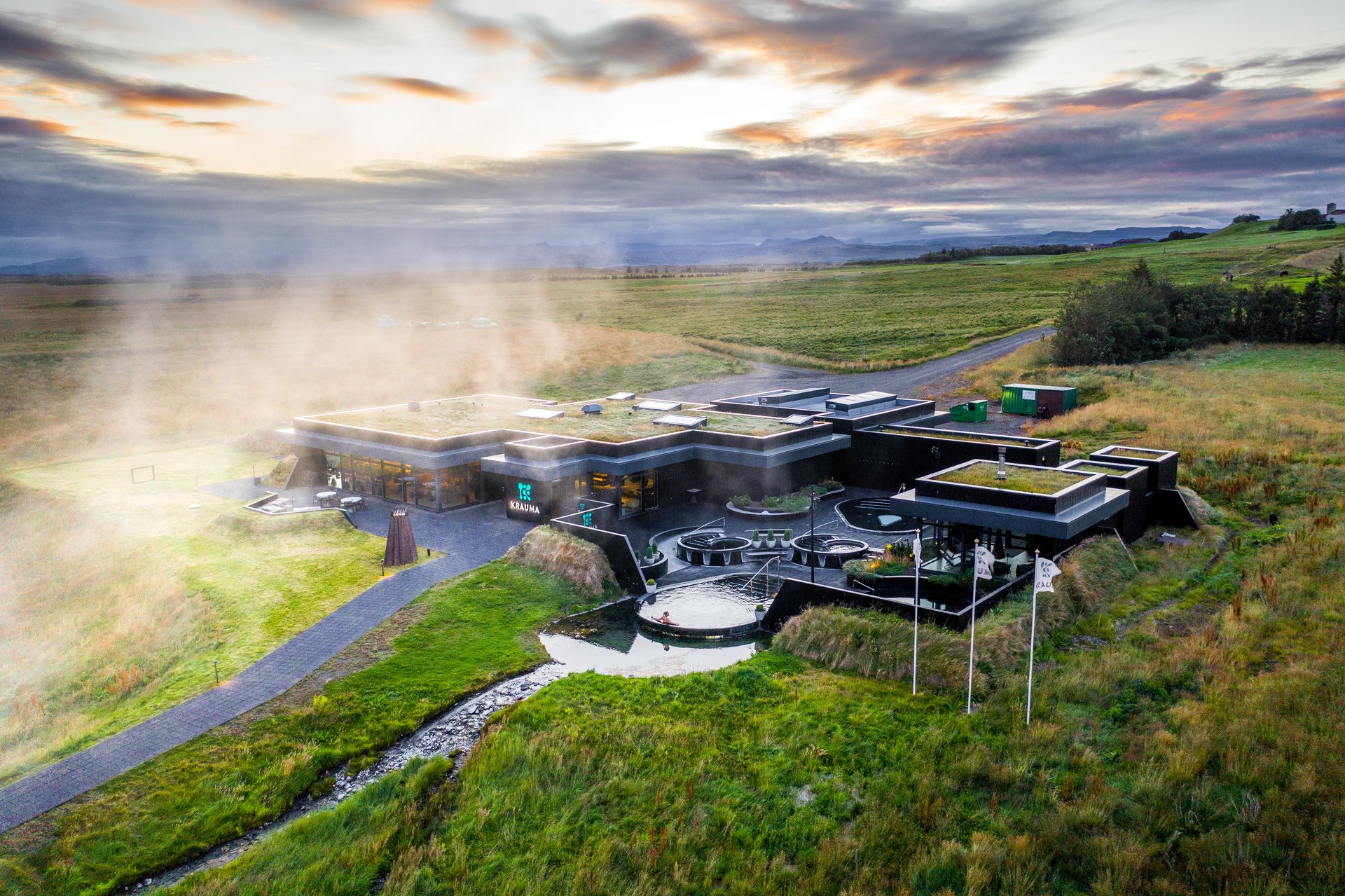 Panoramic views from geothermal pools overlooking West Iceland countryside