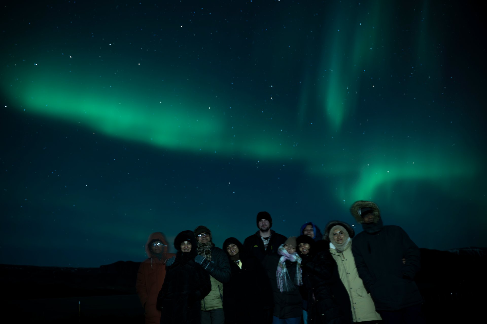 Expert-guided small group aurora hunting tour under Iceland's spectacular Northern Lights