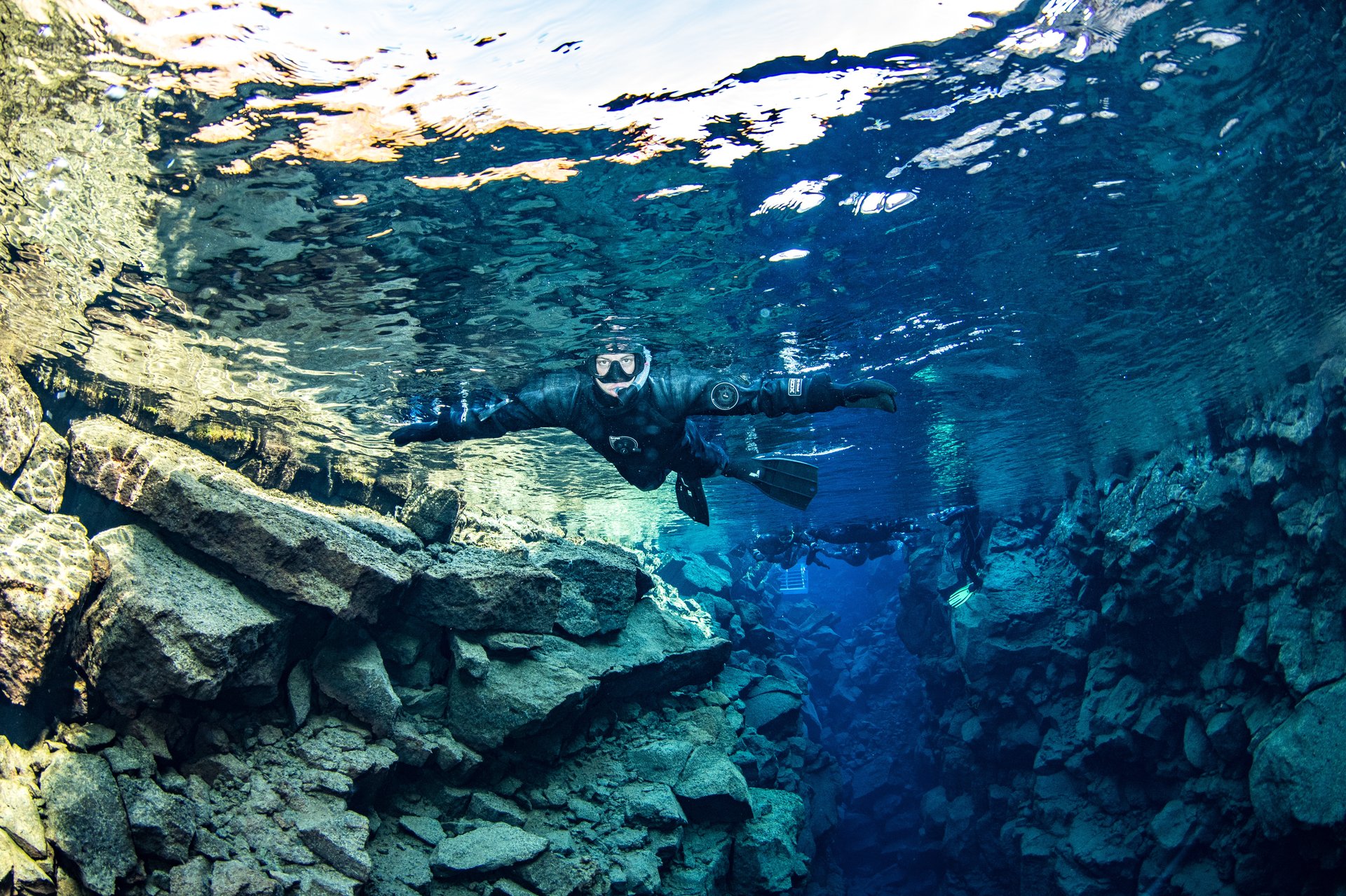 Crystal-clear glacial water snorkeling between continental plates Silfra Þingvellir