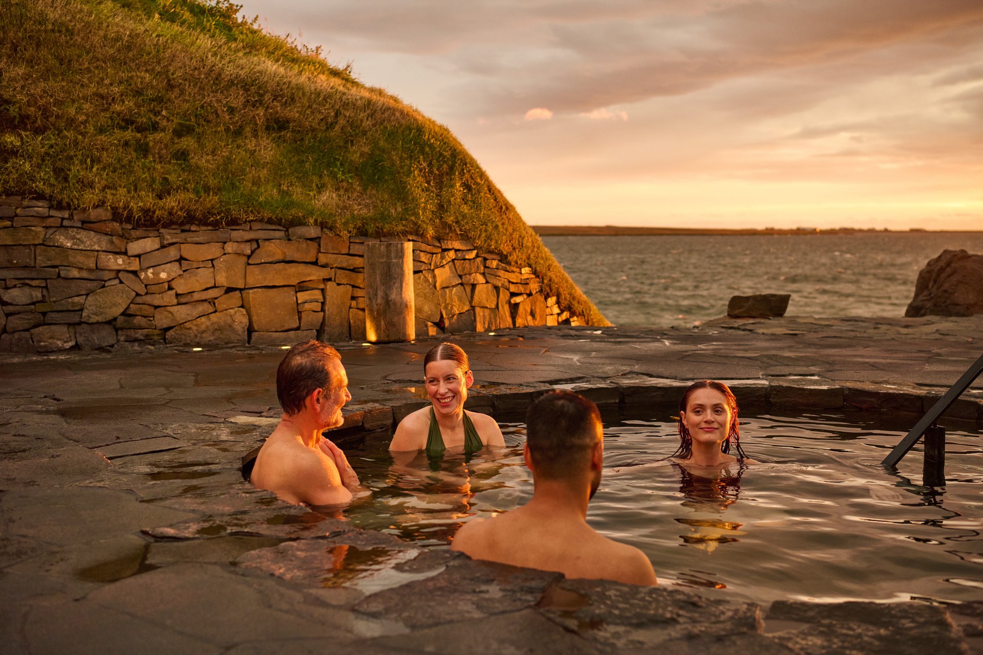 Infinity edge pool merging with Atlantic Ocean horizon at Sky Lagoon