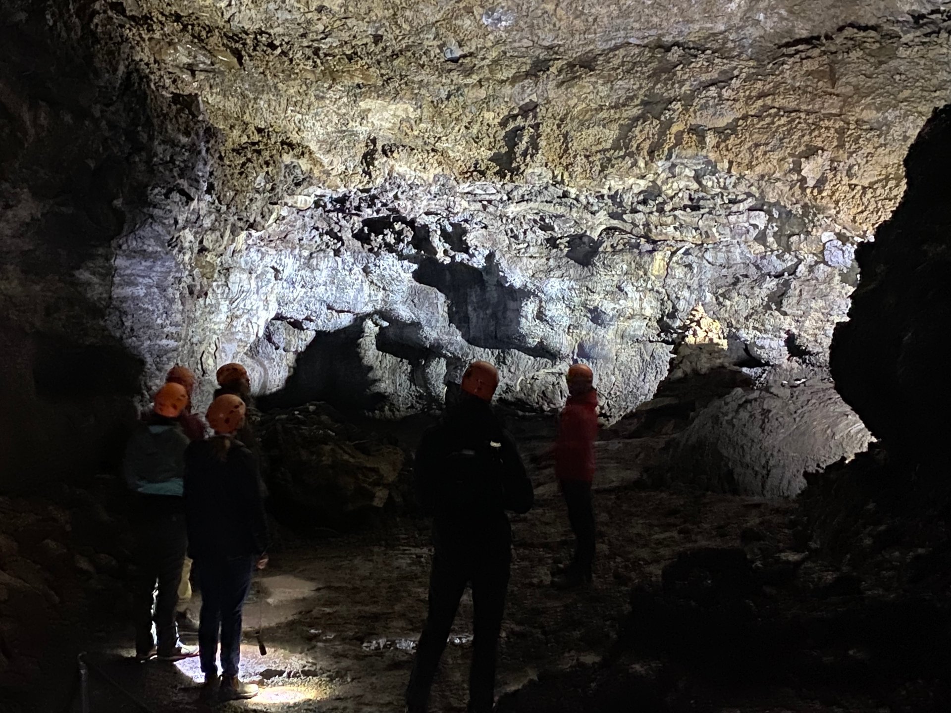 Colorful rock formations inside Vatnshellir lava tube