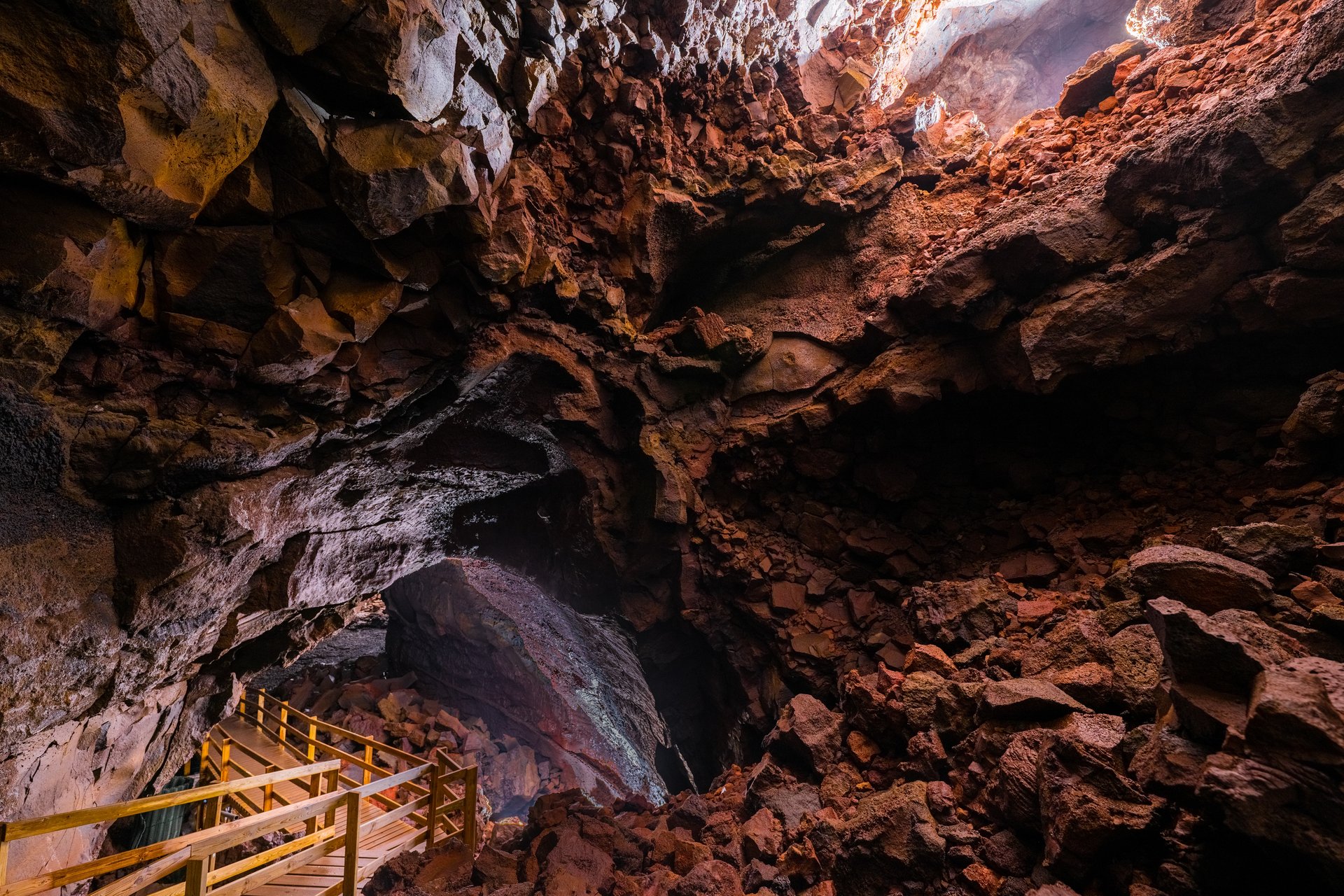 Spectacular illuminated volcanic formations inside Viðgelmir lava cave