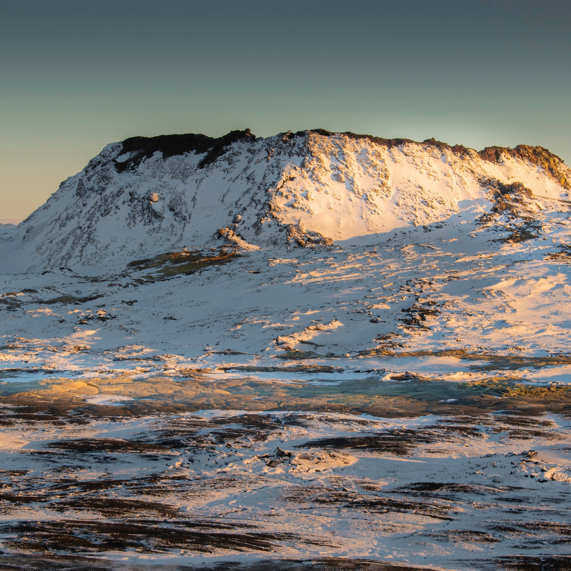 Hikers on the ridge overlooking Fagradalsfjall lava fields