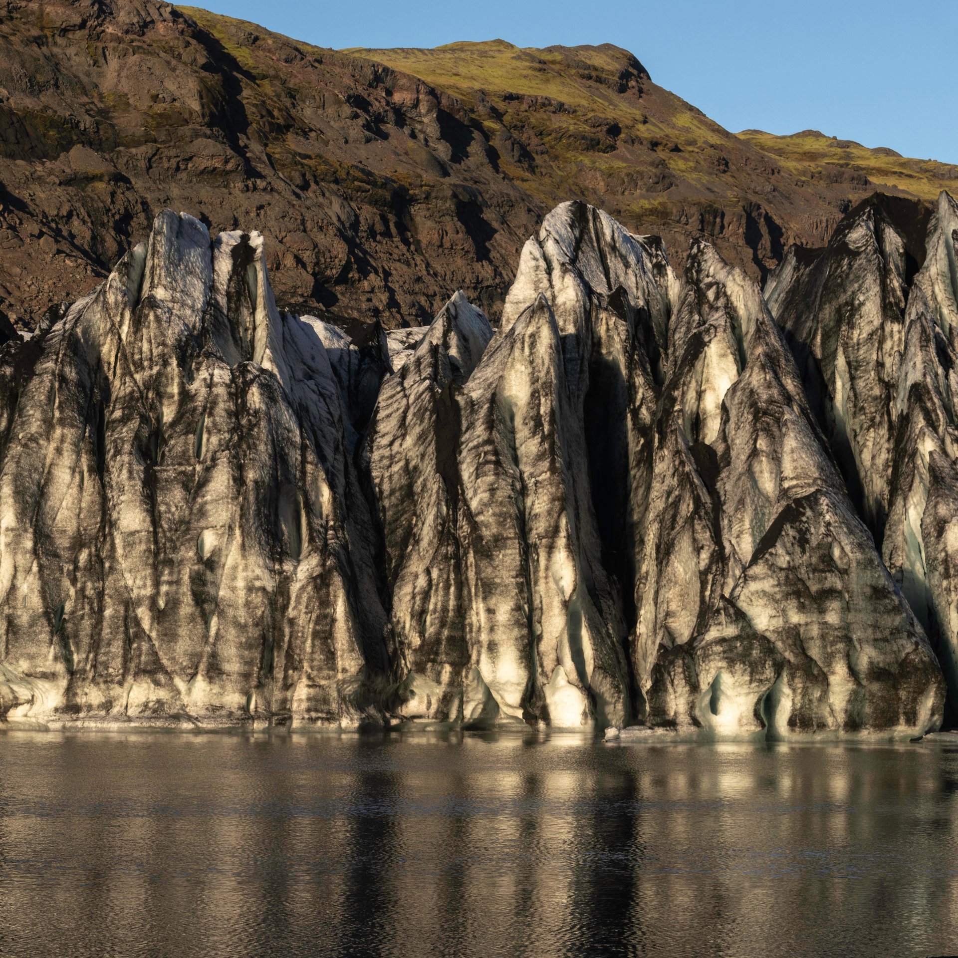 Certified guide teaching glacier safety techniques