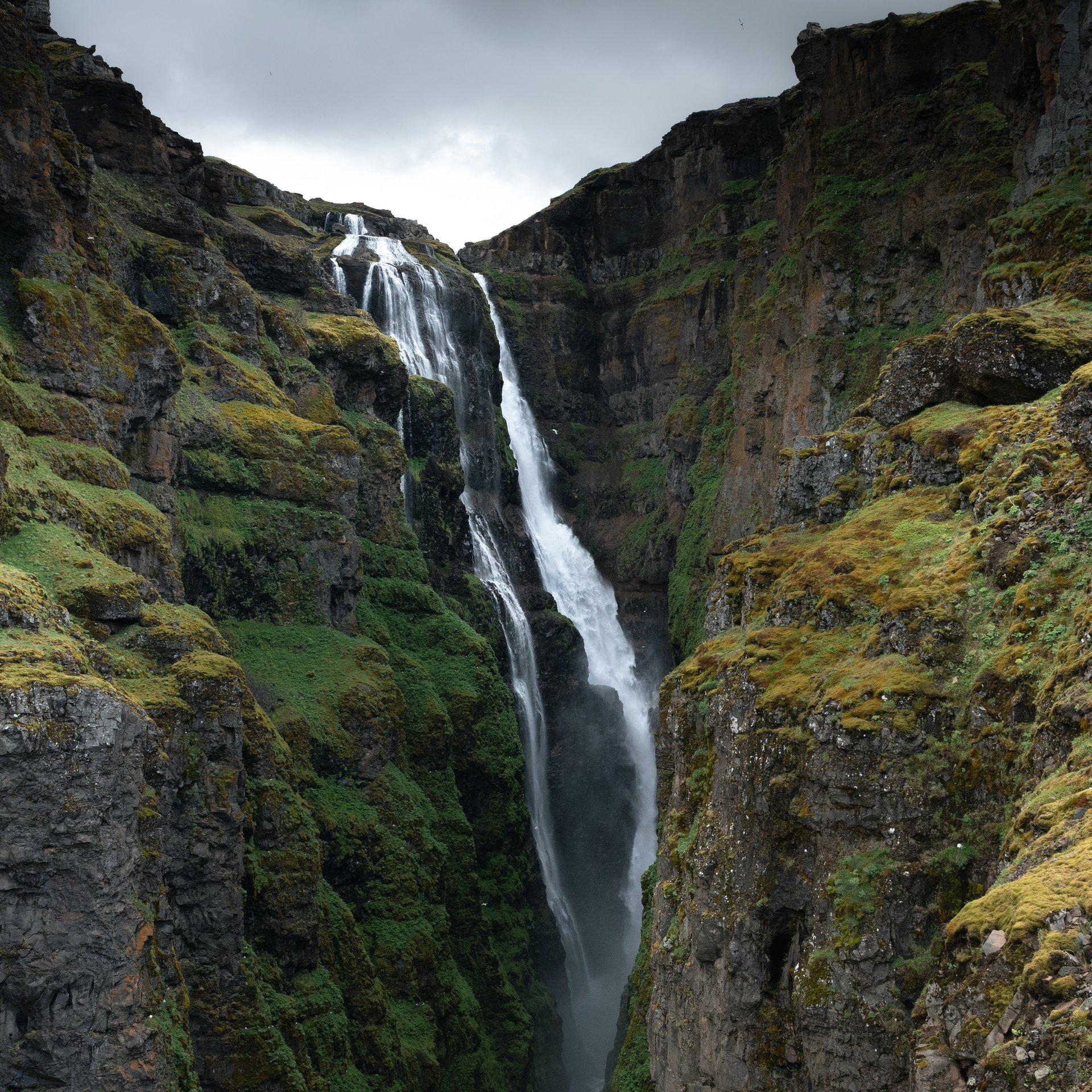 Panoramic view from Glymur waterfall viewpoint with canyon walls