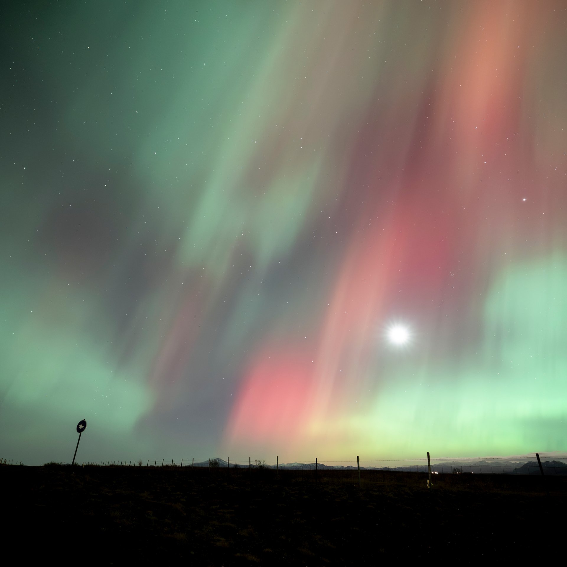 Northern Lights illuminating Iceland's dramatic winter scenery