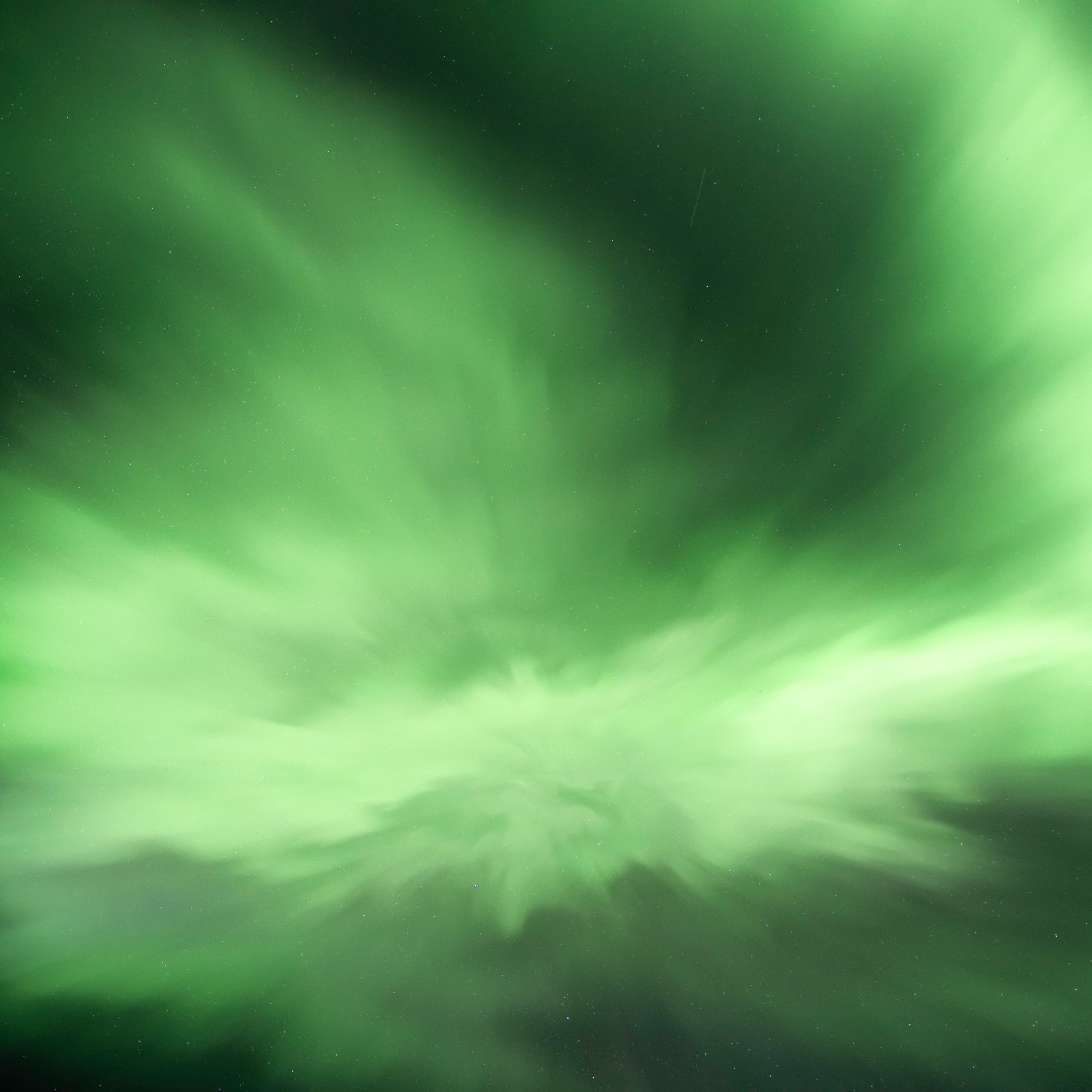 Majestic Aurora Borealis display over Iceland's natural wonders