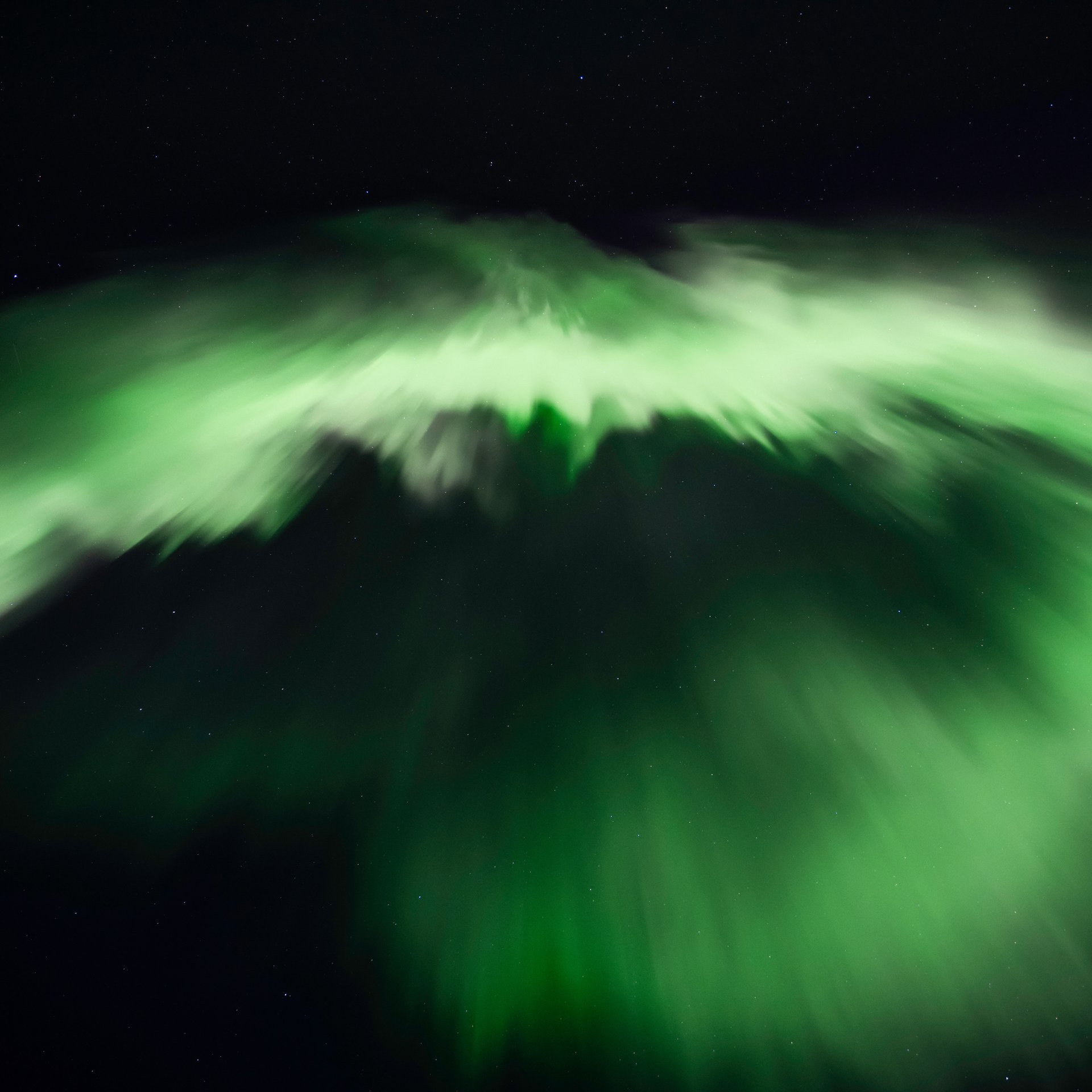 Aurora Borealis reflection in pristine Icelandic lake