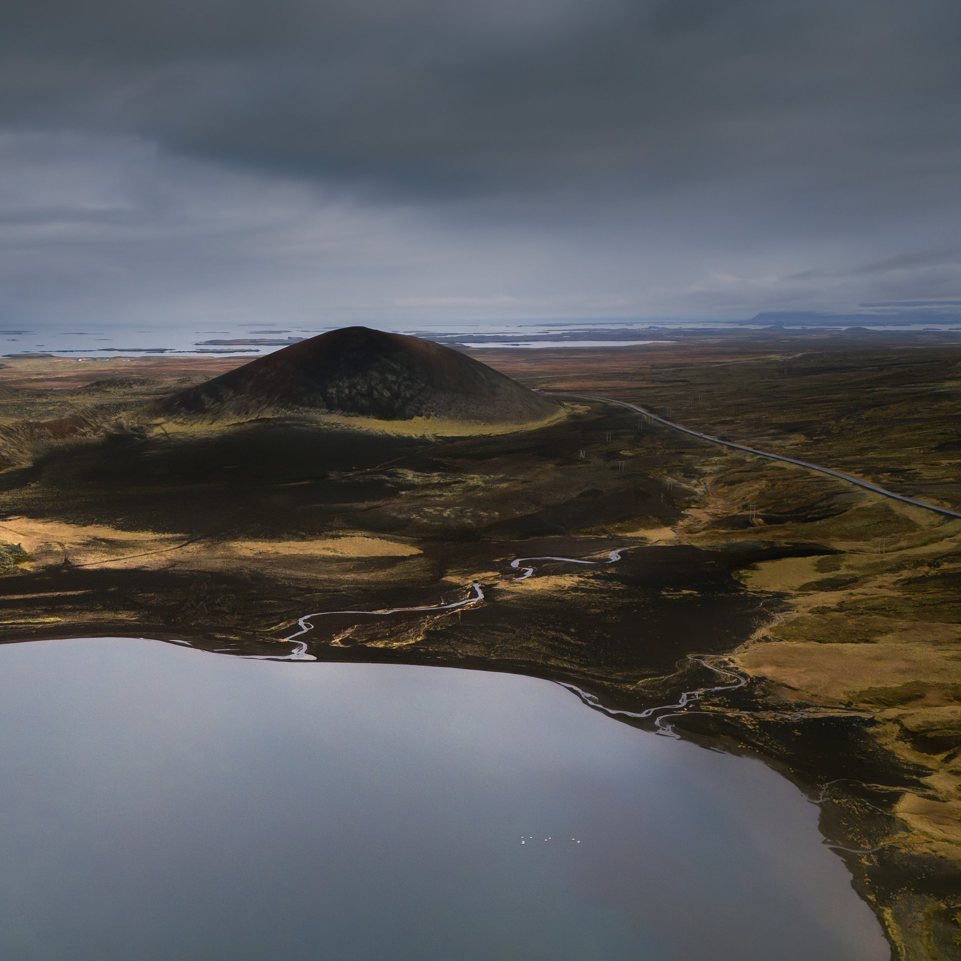 Dramatic coastal cliffs and rock formations at Arnarstapi