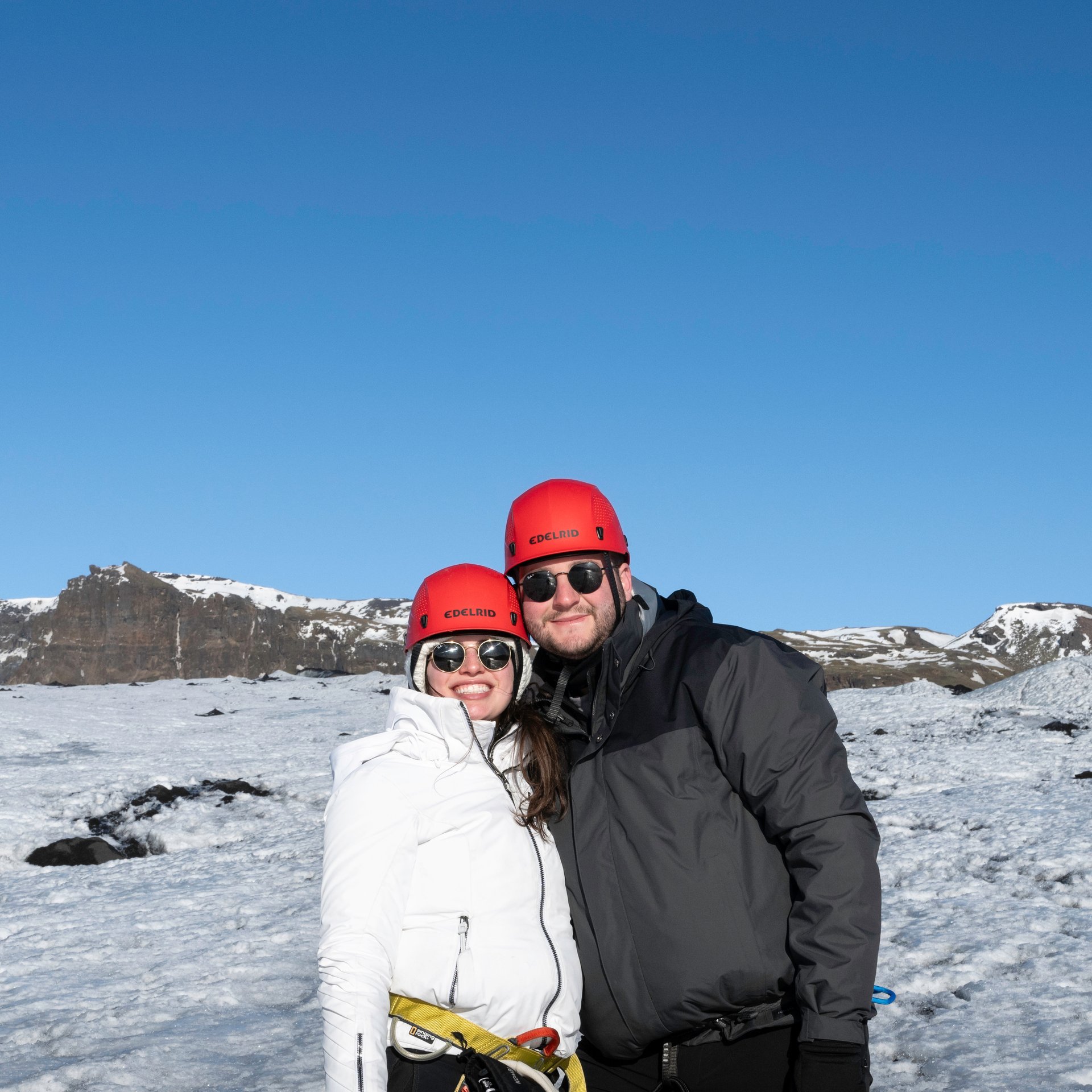 Wide view of glacier rim and rugged terrain