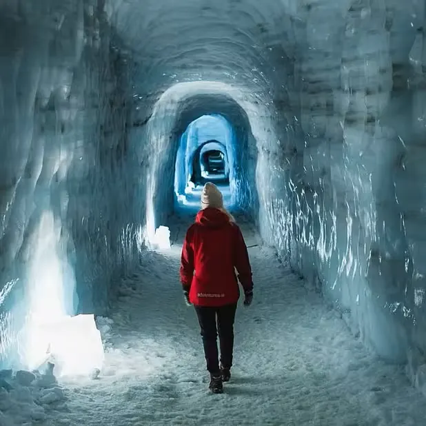 Man-made ice tunnels inside Langjökull glacier with blue ice formations