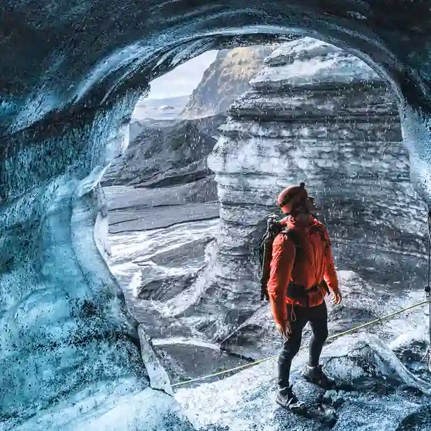 Katla volcanic ice cave with blue ice and ash layers