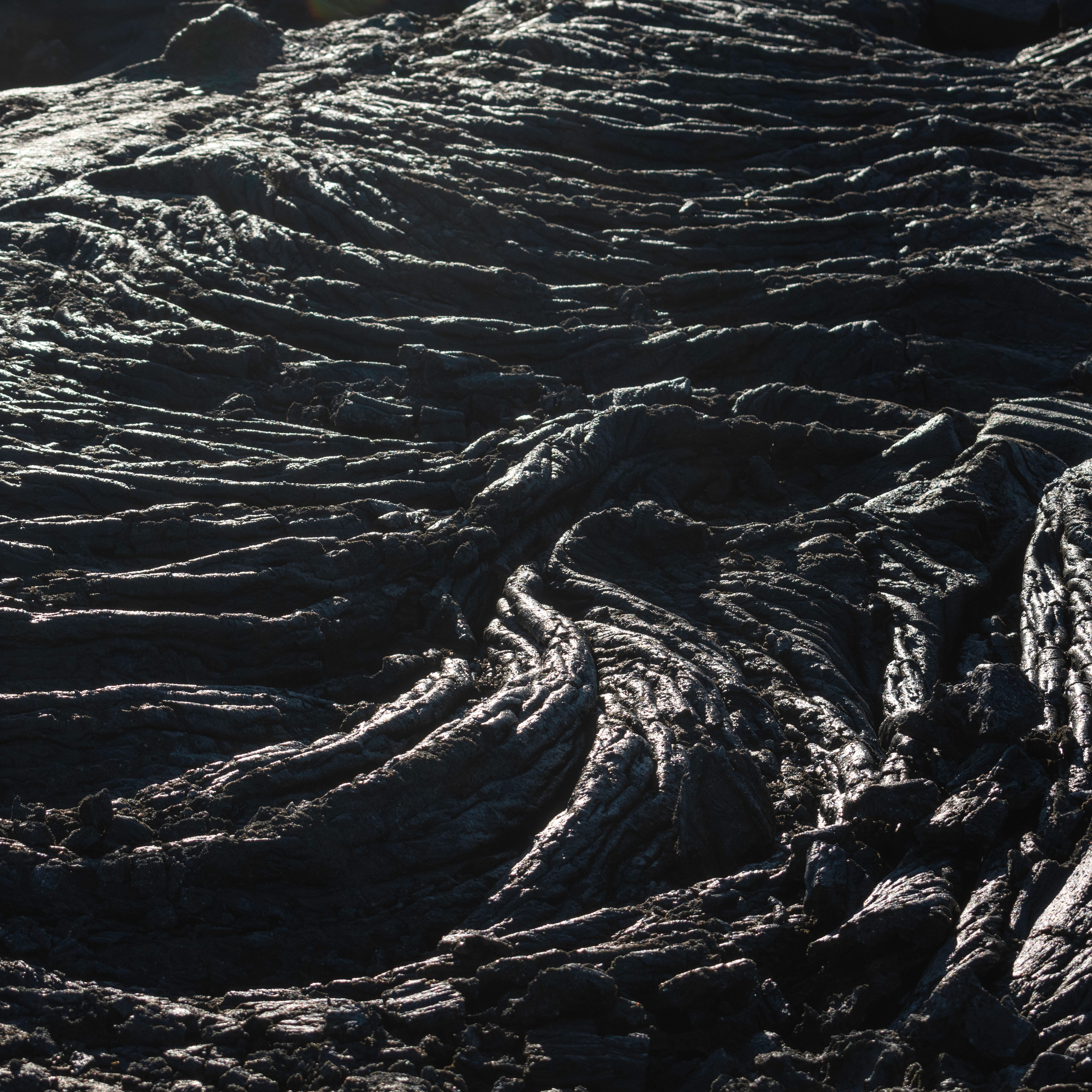 Hikers on the Fagradalsfjall trail overlooking the 2021 eruption lava fields