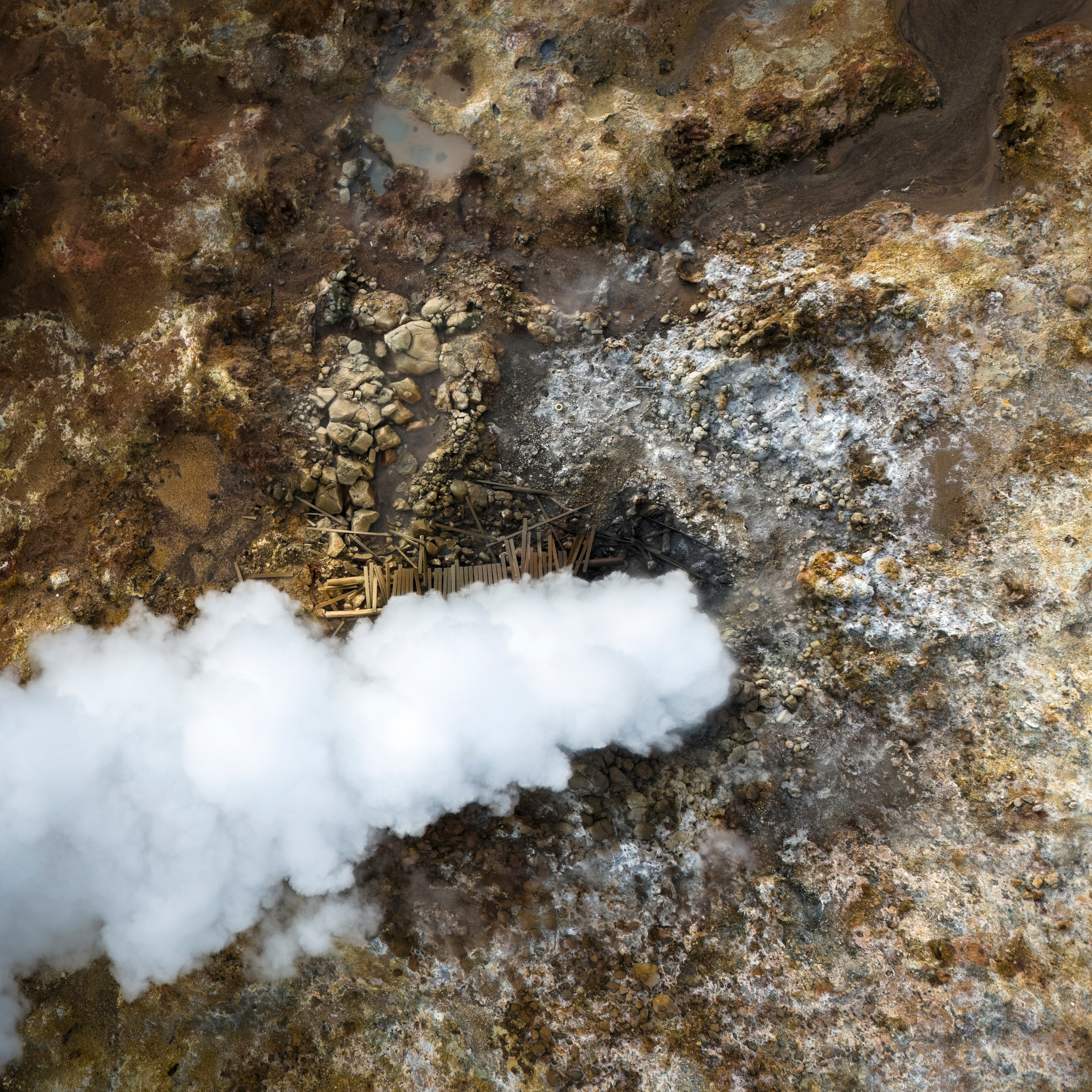 Volcanic Reykjanes Peninsula landscape with geothermal steam and lava fields