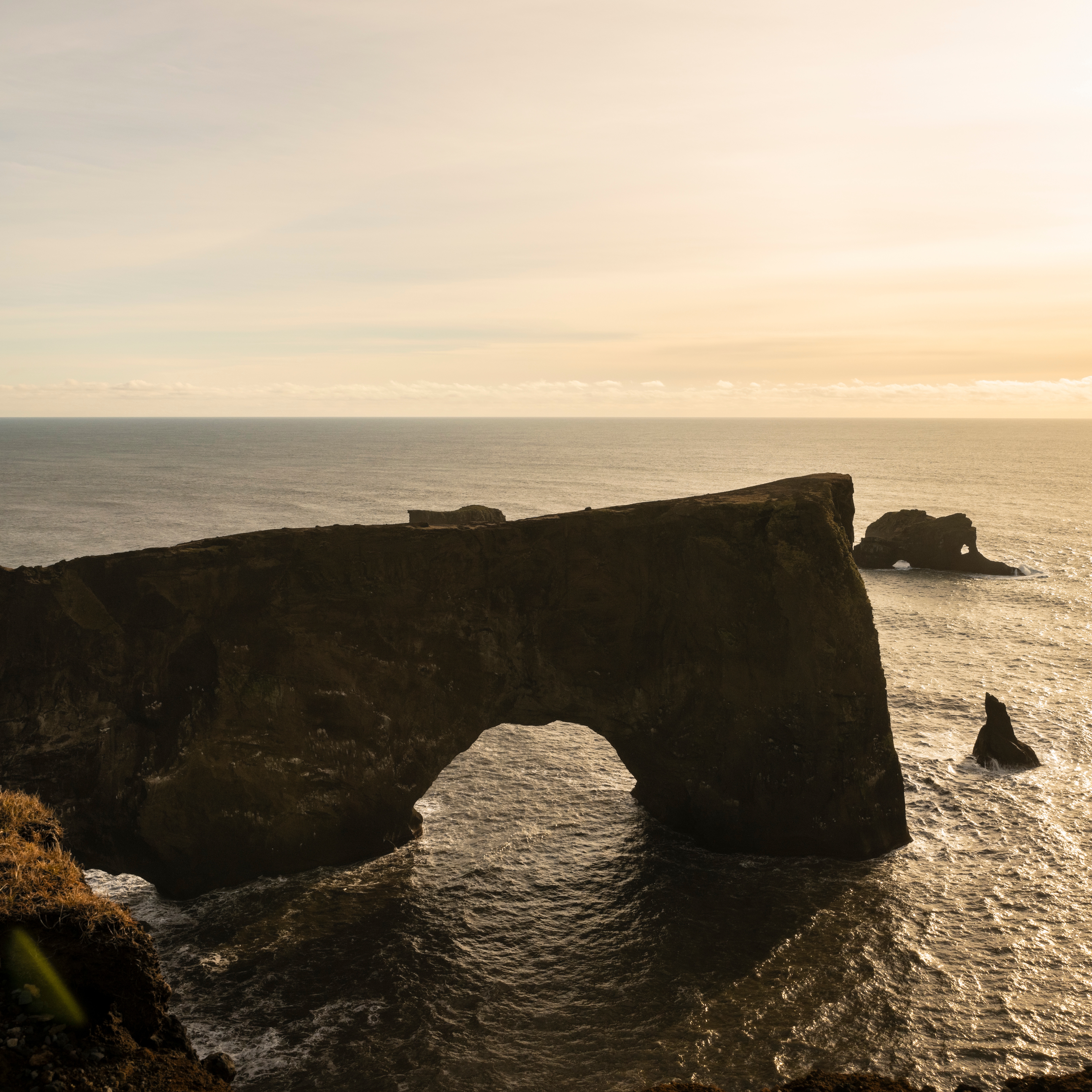 Mist and rainbow at Skógafoss waterfall on a private South Coast tour