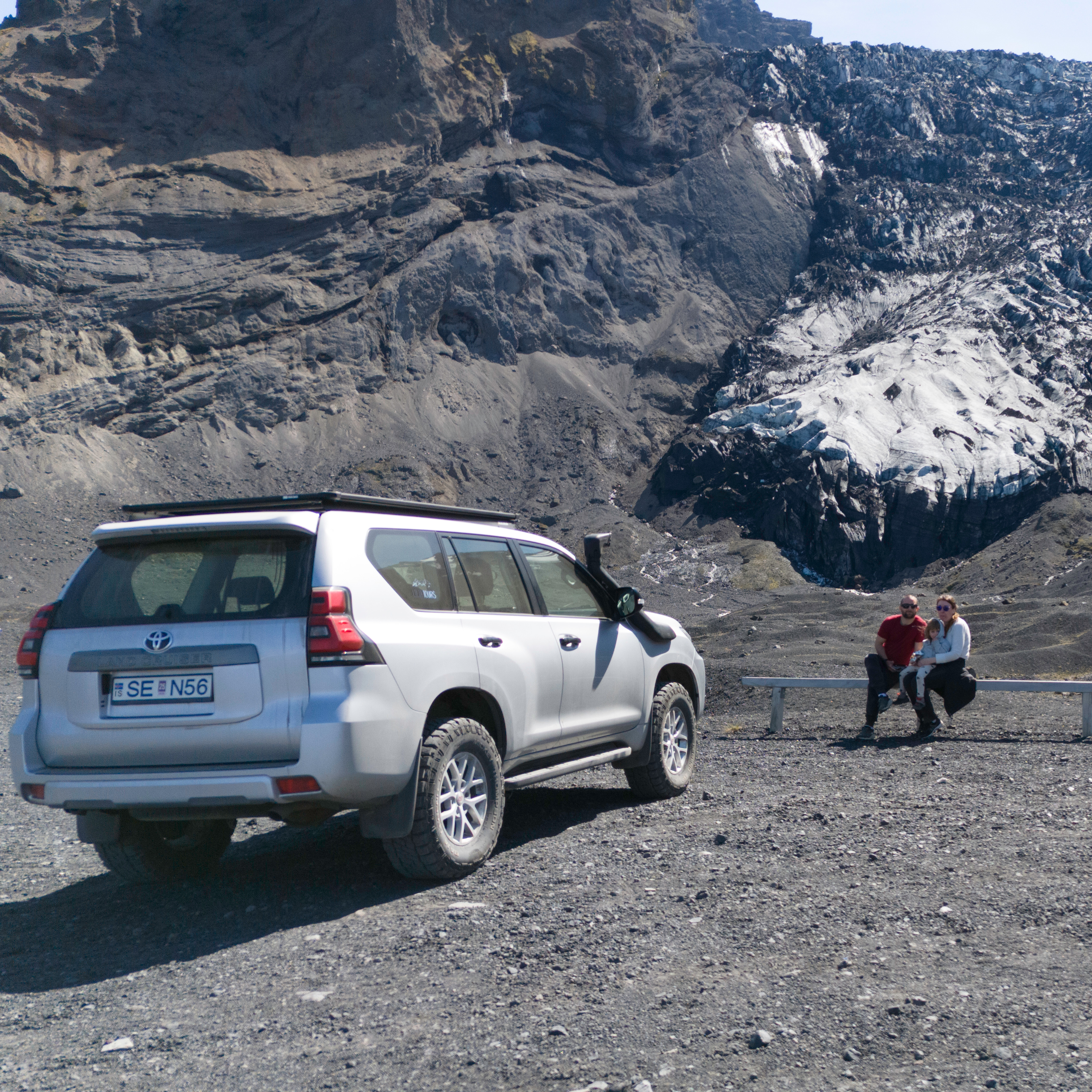 Moss-draped walls of Nauthúsagíl canyon rising above the hiking trail